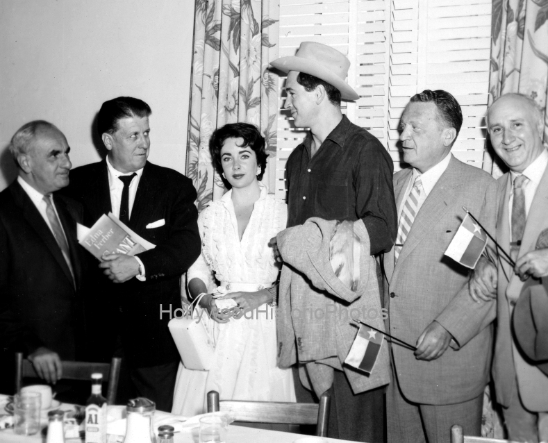 George Stevens 1956 Elizabeth Taylor and Rock Hudson signing contract for Giant wm.jpg